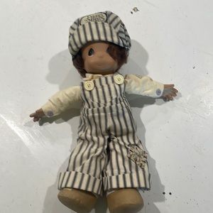 Precious moments train conductor